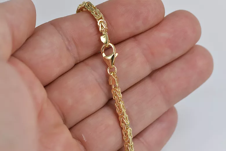 Premium Photo | Bracelet gold made with 585 14k gold balls and cord