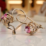 Vintage earrings made of 14k 585 rose gold with Ruby vec145